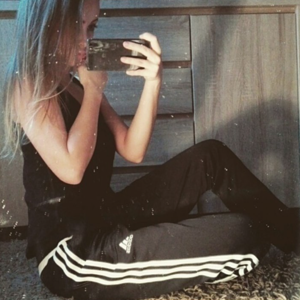 Girl in adidas condivo pants