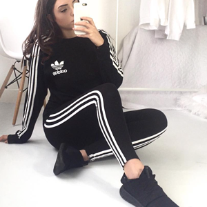 Girl in full adidas gear
