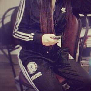 Shiny girl in tracksuit