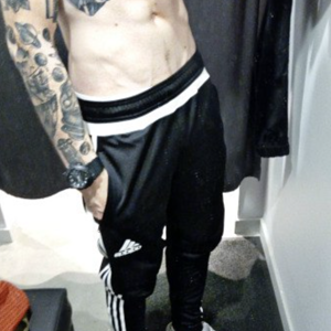 Guy in adidas trackies