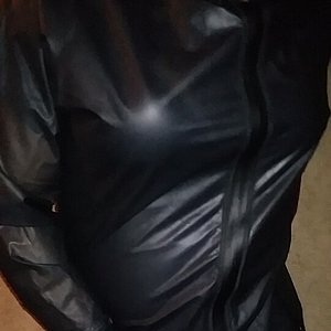 Me in full body rubber suit. Off camera my husband in the same thing
