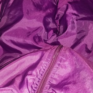 Purple swishy puma suit