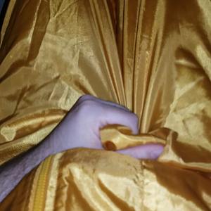 Playing in a gold shellsuit