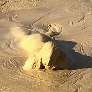 Plus size lady in adidas jumpsuit