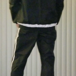 Adidas slick nylon rain suit.