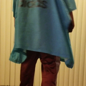 Adidas poncho over mystery Adidas suit