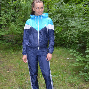 womens-adidas-essentials-three-stripes-tracksuit-woven.jpg