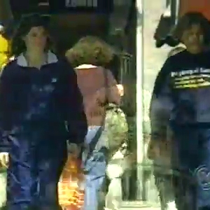 woman nike shellsuit.mp4