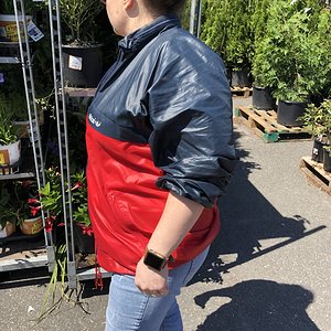 out in shiny vintage adidas windbreaker