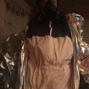 Columbia packable rainsuit under an aluminized hazmat suit