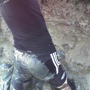 Mud fun in Adidas nylon shorts