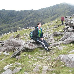 Adidas black pants hillside view