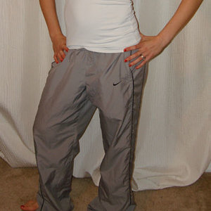 Girl in gray Nike pants