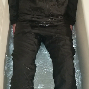 Nylon shellsuit in the tub