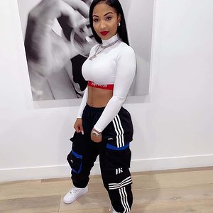 Shenseea Rocks Glam Off-Duty Look In Guess Logo Pullover & Joggers.jpg