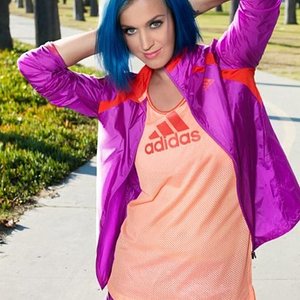 Katy Perry in pink adidas rain jacket and pink nylon shorts.jpg
