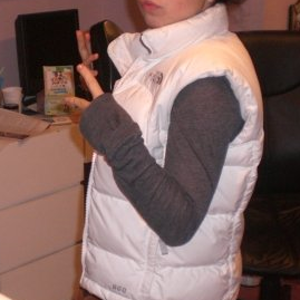 White TNF nuptse gilet girl