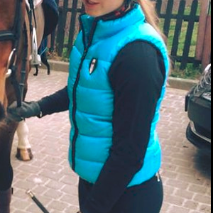 Blue gilet girl with horse