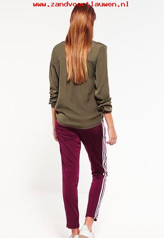 5919bb7cb6311-DamesKledingadidasOriginalsTrainingsbroekmaroonDonkerlilaXP6UDH7I-0.jpg