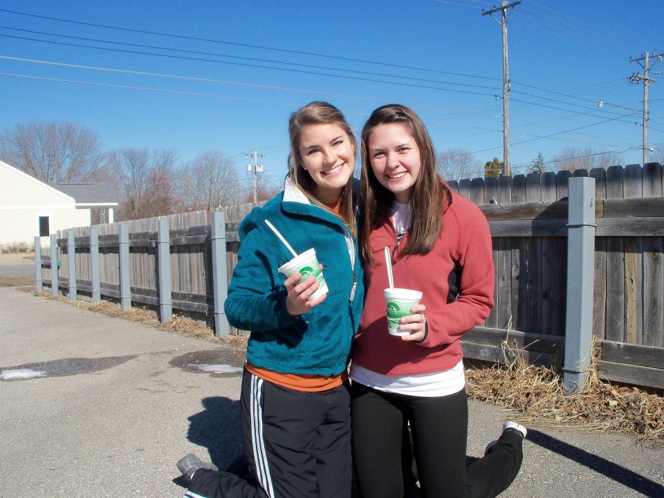 Adidas black pants friends share drinks