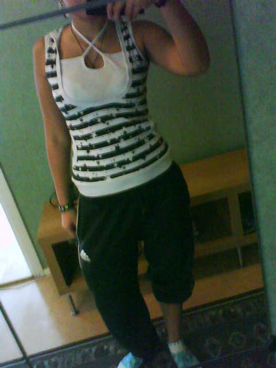 Adidas womens black baggy pants with black and white top front shot