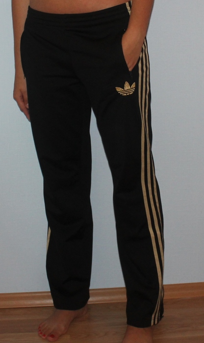 Adidas womens black pants gold trim front view