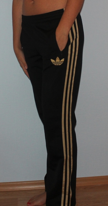 Adidas womens black pants gold trim side view