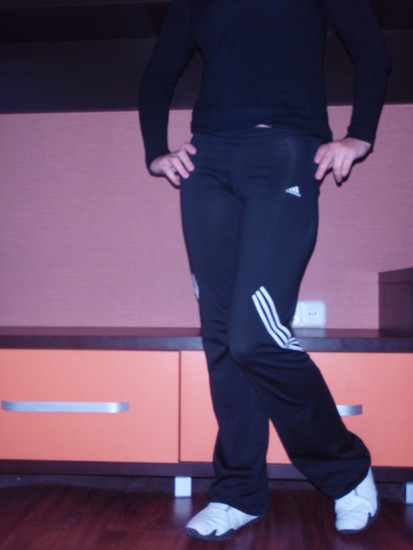 Adidas womens black pants sassy pose