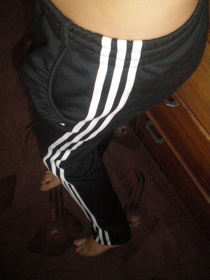 Adidas womens black pants white stripe dance pose