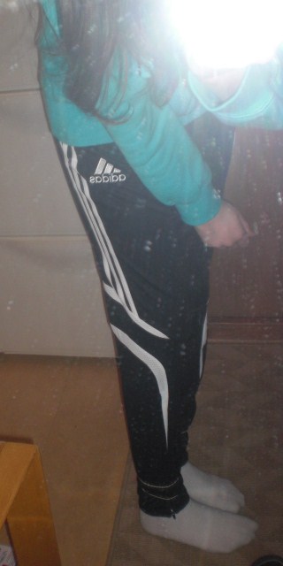 Adidas womens black pants with white stripe side logo shot