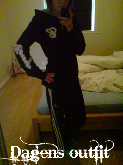 Adidas womens black track suit semi side angle pose