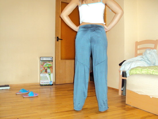 Adidas womens blue pants pose