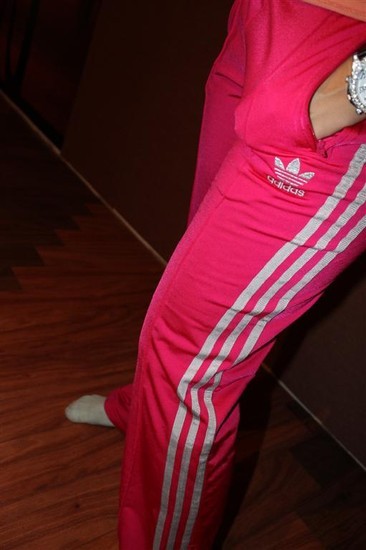 Adidas womens light red pants high angle side shot