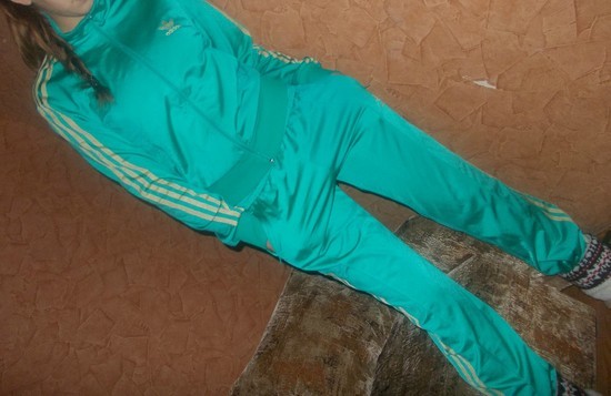 Adidas womens teal track suit angle