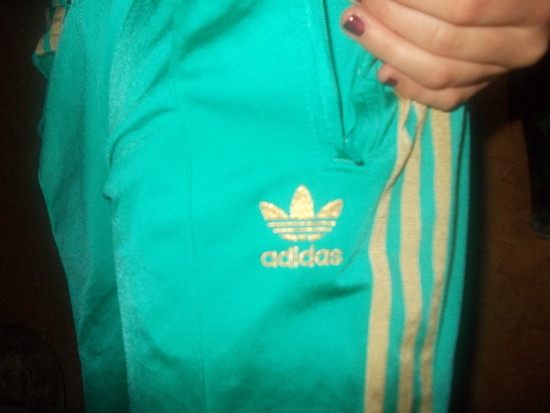 Adidas womens teal track suit pockets
