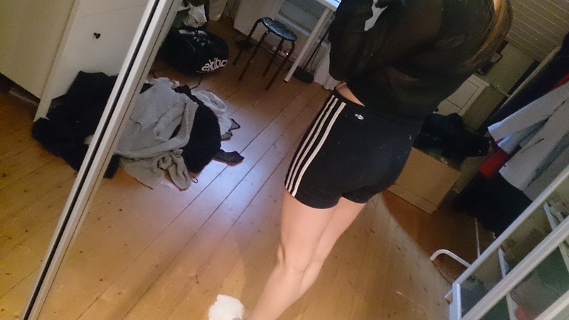 Athletic girl in Adidas shorts
