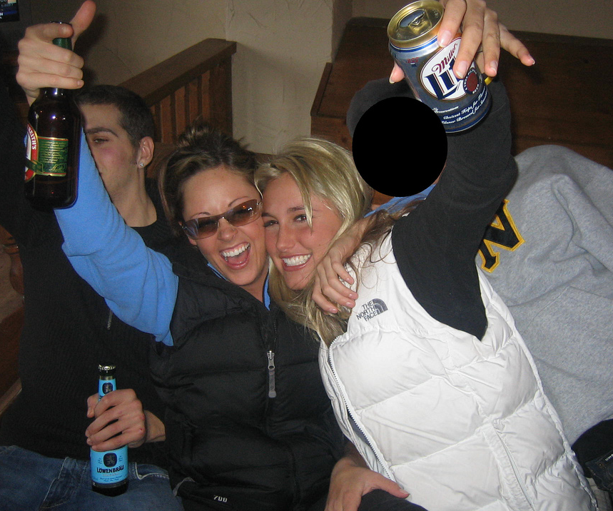 Black and white nuptse gilet girls