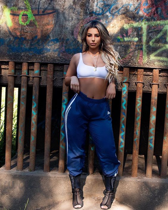 blue adidas pants with boots