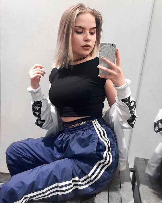 blue adidas pants with white kappa jacket