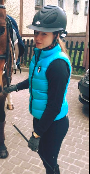 Blue gilet girl with horse