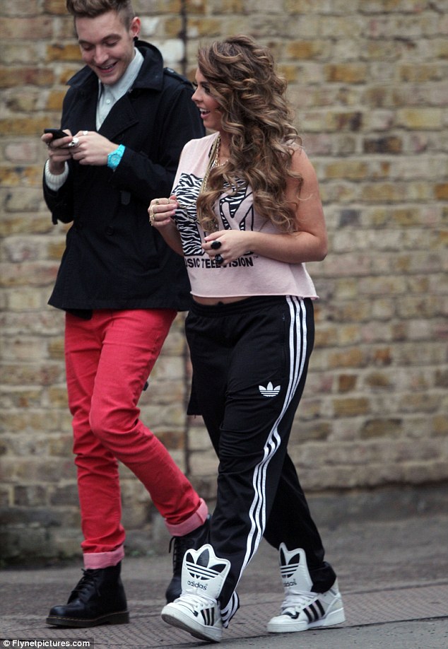 Celeb hottie in Adidas Firebird pants