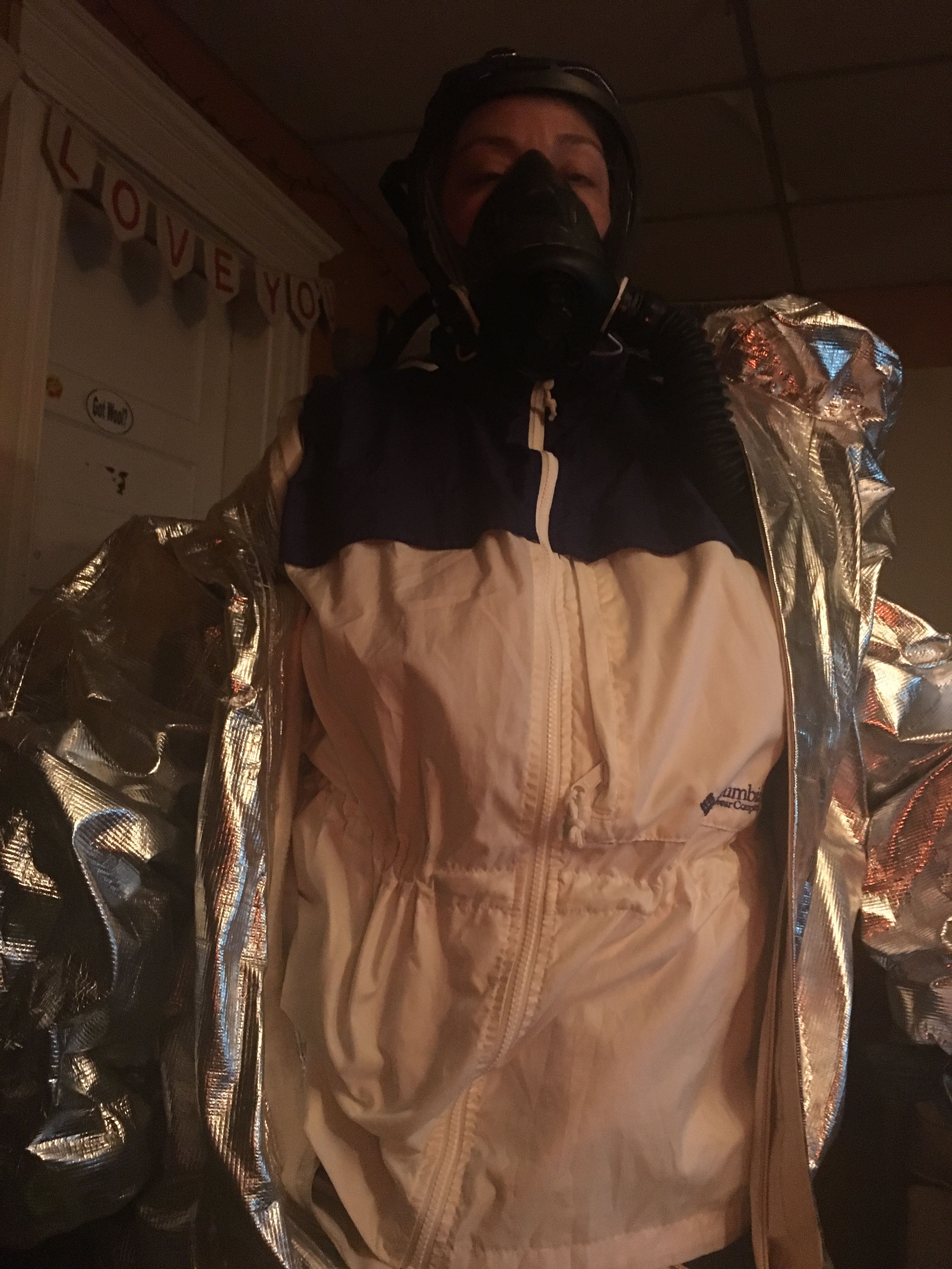 Columbia packable rainsuit under an aluminized hazmat suit