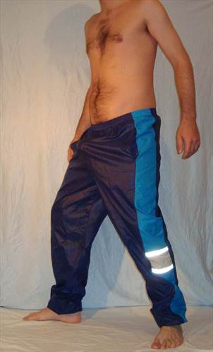 Dark blue nylon trackies