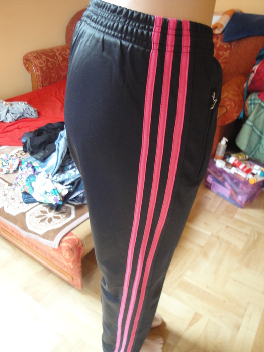 Girl in Adidas black/pink pants
