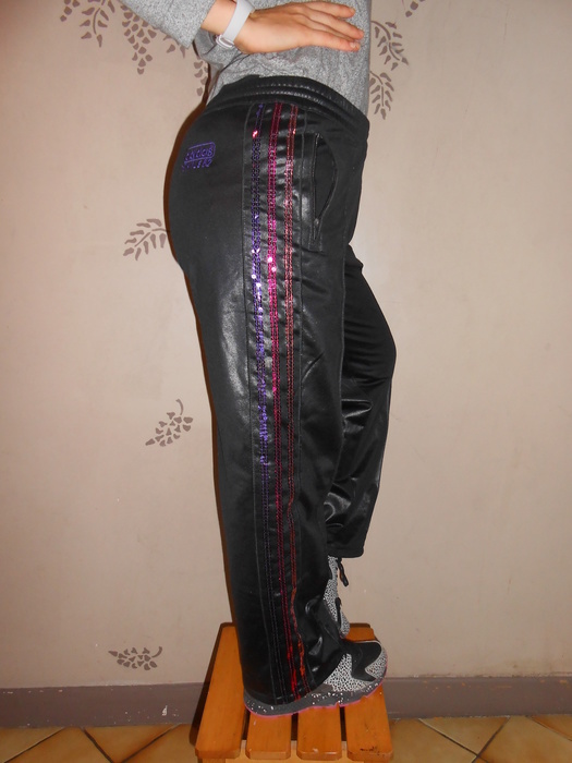 Girl in Adidas Chile pants