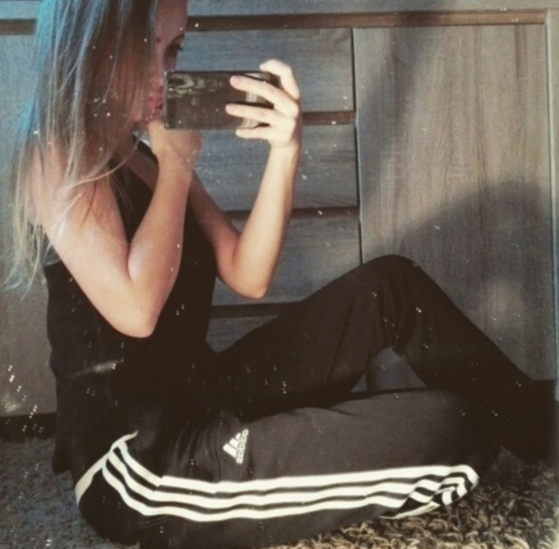 Girl in adidas condivo pants