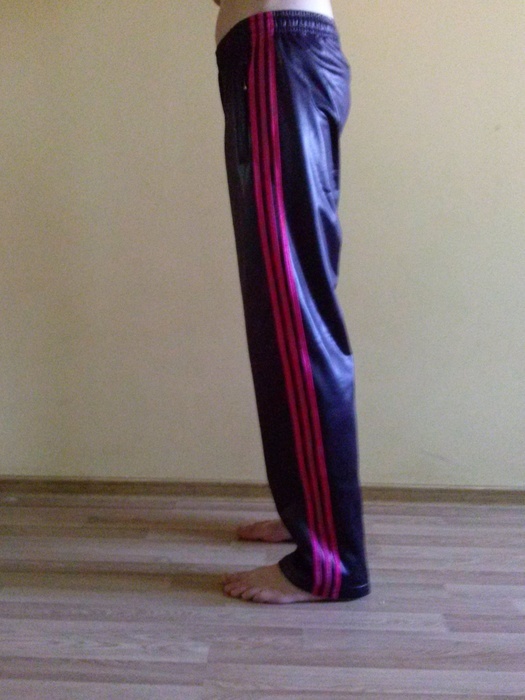 Girl in Adidas pants black / red