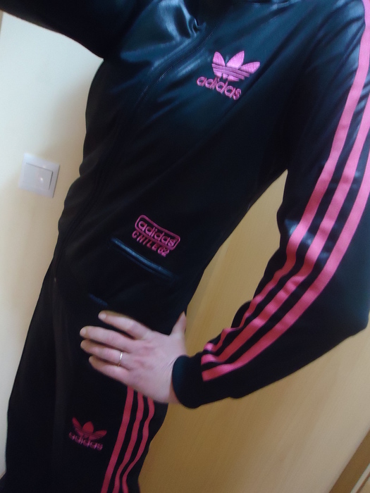 Girl in black/pink Adidas Chile outfit