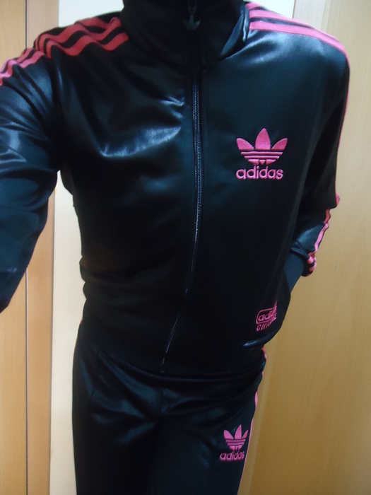 Girl in black/pink Adidas Chile outfit