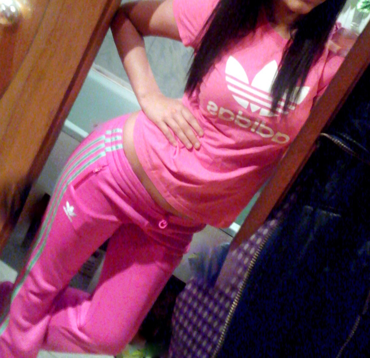 Girl in pink adidas clothes